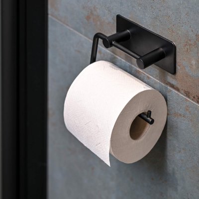Toiletpapirholder, der monteres med tape